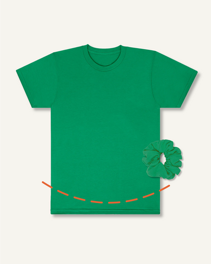 Green t-shirt with: (1) an arced orange dotted line above the shirt's hemline, implying the t-shirt will be cropped and finished with a round hemline and (2) a matching green scrunchie, implying the t-shirt's scraps will be made into a Scrap Scrunchie.